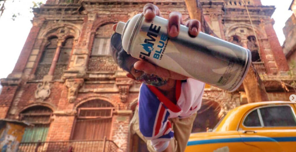 Graffiti artist holding a spray can